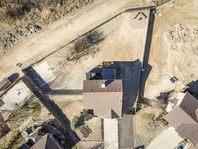 This spacious 2-story home offers 2,354 sq ft with 5 bedrooms, 3 on Desert Hawk At Pueblo West in Colorado - for sale on GolfHomes.com, golf home, golf lot