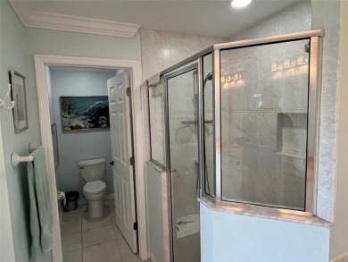 A unique opportunity to own a custom-built duplex with 2 car on Duffys Golf Center in Florida - for sale on GolfHomes.com, golf home, golf lot