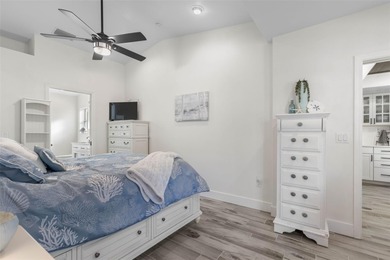 Step inside and exhale--from morning coffee by the pool to on Palm Harbor Golf Club in Florida - for sale on GolfHomes.com, golf home, golf lot