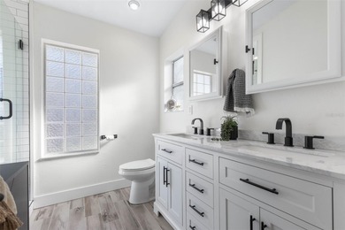 Step inside and exhale--from morning coffee by the pool to on Palm Harbor Golf Club in Florida - for sale on GolfHomes.com, golf home, golf lot