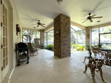 A NEW REDUCED LIST PRICE.  A gorgeous custom 5 bedroom 3 full on Temple Terrace Golf and Country Club in Florida - for sale on GolfHomes.com, golf home, golf lot