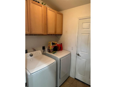 A unique opportunity to own a custom-built duplex with 2 car on Duffys Golf Center in Florida - for sale on GolfHomes.com, golf home, golf lot