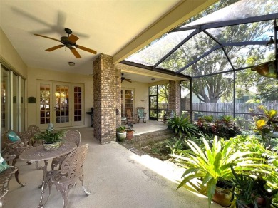 A NEW REDUCED LIST PRICE.  A gorgeous custom 5 bedroom 3 full on Temple Terrace Golf and Country Club in Florida - for sale on GolfHomes.com, golf home, golf lot