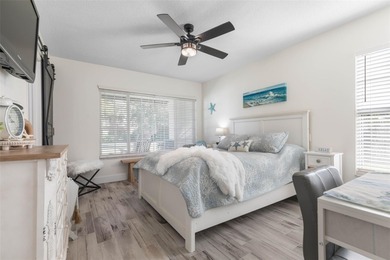 Step inside and exhale--from morning coffee by the pool to on Palm Harbor Golf Club in Florida - for sale on GolfHomes.com, golf home, golf lot