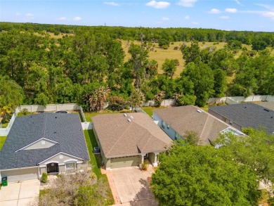 Investors take note, or anyone wanting a home below market price on Lexington Oaks Golf Club in Florida - for sale on GolfHomes.com, golf home, golf lot