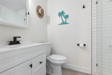 Step inside and exhale--from morning coffee by the pool to on Palm Harbor Golf Club in Florida - for sale on GolfHomes.com, golf home, golf lot