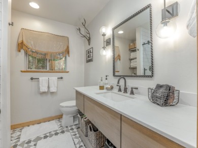 Just a stone's throw from Monte Verde Lake, this fully remodeled on Angel Fire Resort Country Club in New Mexico - for sale on GolfHomes.com, golf home, golf lot