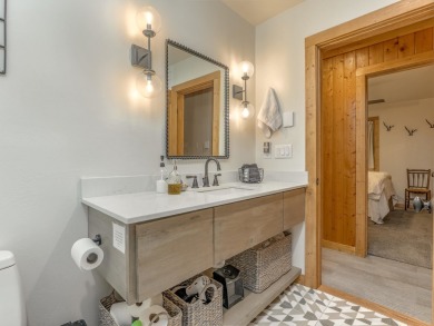 Just a stone's throw from Monte Verde Lake, this fully remodeled on Angel Fire Resort Country Club in New Mexico - for sale on GolfHomes.com, golf home, golf lot