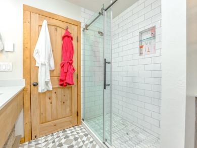 Just a stone's throw from Monte Verde Lake, this fully remodeled on Angel Fire Resort Country Club in New Mexico - for sale on GolfHomes.com, golf home, golf lot