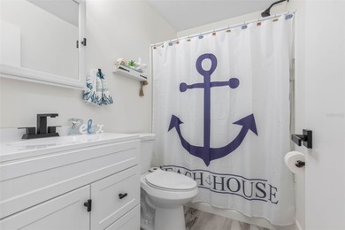 Step inside and exhale--from morning coffee by the pool to on Palm Harbor Golf Club in Florida - for sale on GolfHomes.com, golf home, golf lot