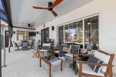 Step inside and exhale--from morning coffee by the pool to on Palm Harbor Golf Club in Florida - for sale on GolfHomes.com, golf home, golf lot