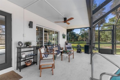 Step inside and exhale--from morning coffee by the pool to on Palm Harbor Golf Club in Florida - for sale on GolfHomes.com, golf home, golf lot