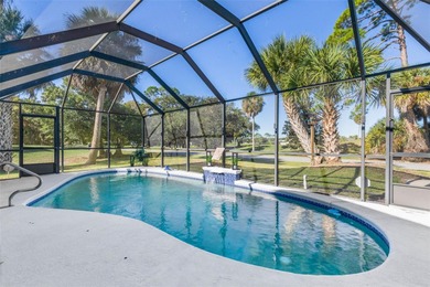 Step inside and exhale--from morning coffee by the pool to on Palm Harbor Golf Club in Florida - for sale on GolfHomes.com, golf home, golf lot