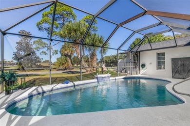 Step inside and exhale--from morning coffee by the pool to on Palm Harbor Golf Club in Florida - for sale on GolfHomes.com, golf home, golf lot