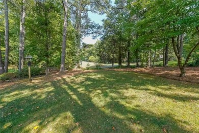 Welcome home to this beautiful 3-sided brick home situated on on Brookstone Golf and Country Club in Georgia - for sale on GolfHomes.com, golf home, golf lot