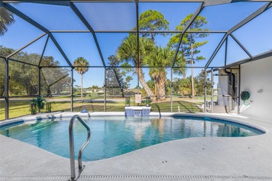 Step inside and exhale--from morning coffee by the pool to on Palm Harbor Golf Club in Florida - for sale on GolfHomes.com, golf home, golf lot
