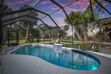 Step inside and exhale--from morning coffee by the pool to on Palm Harbor Golf Club in Florida - for sale on GolfHomes.com, golf home, golf lot