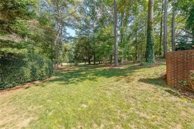 Welcome home to this beautiful 3-sided brick home situated on on Brookstone Golf and Country Club in Georgia - for sale on GolfHomes.com, golf home, golf lot