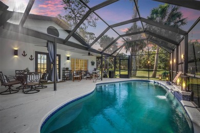 Step inside and exhale--from morning coffee by the pool to on Palm Harbor Golf Club in Florida - for sale on GolfHomes.com, golf home, golf lot