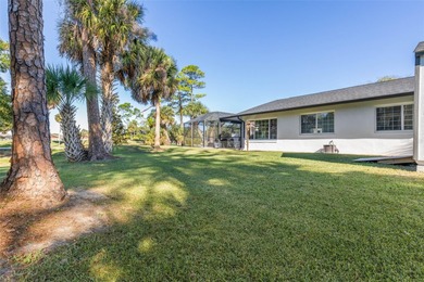 Step inside and exhale--from morning coffee by the pool to on Palm Harbor Golf Club in Florida - for sale on GolfHomes.com, golf home, golf lot