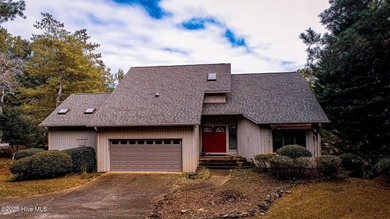 Lake front on Lake Pinehurst! 1050 Burning Tree, tucked back in on Pinehurst Resort and Country Club in North Carolina - for sale on GolfHomes.com, golf home, golf lot