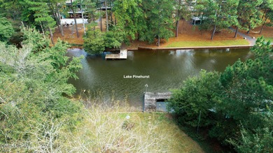 Lake front on Lake Pinehurst! 1050 Burning Tree, tucked back in on Pinehurst Resort and Country Club in North Carolina - for sale on GolfHomes.com, golf home, golf lot