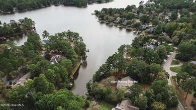 Lake front on Lake Pinehurst! 1050 Burning Tree, tucked back in on Pinehurst Resort and Country Club in North Carolina - for sale on GolfHomes.com, golf home, golf lot