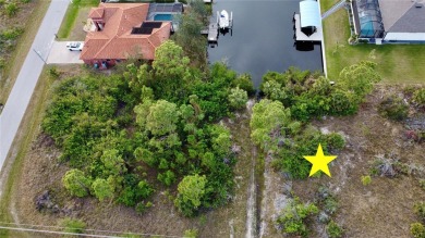 This exceptional WATERFRONT lot in South Gulf Cove offers direct on Rotonda Golf and Country Club - Long Marsh  in Florida - for sale on GolfHomes.com, golf home, golf lot