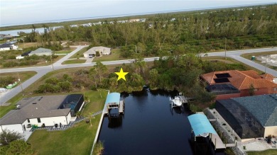 This exceptional WATERFRONT lot in South Gulf Cove offers direct on Rotonda Golf and Country Club - Long Marsh  in Florida - for sale on GolfHomes.com, golf home, golf lot