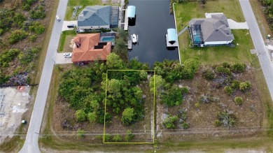 This exceptional WATERFRONT lot in South Gulf Cove offers direct on Rotonda Golf and Country Club - Long Marsh  in Florida - for sale on GolfHomes.com, golf home, golf lot