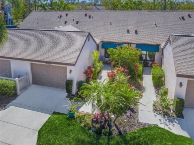 What a *WOW* when you walk into this beautifully updated villa on University Park Country Club in Florida - for sale on GolfHomes.com, golf home, golf lot