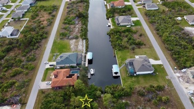 This exceptional WATERFRONT lot in South Gulf Cove offers direct on Rotonda Golf and Country Club - Long Marsh  in Florida - for sale on GolfHomes.com, golf home, golf lot