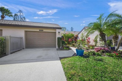 What a *WOW* when you walk into this beautifully updated villa on University Park Country Club in Florida - for sale on GolfHomes.com, golf home, golf lot