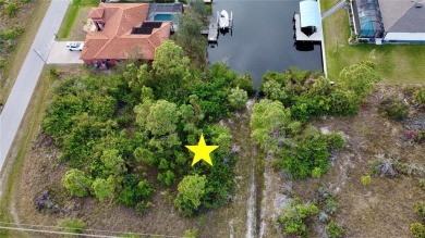 This exceptional WATERFRONT lot in South Gulf Cove offers direct on Rotonda Golf and Country Club - Long Marsh  in Florida - for sale on GolfHomes.com, golf home, golf lot