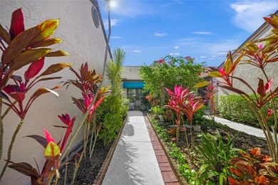 What a *WOW* when you walk into this beautifully updated villa on University Park Country Club in Florida - for sale on GolfHomes.com, golf home, golf lot