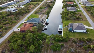 This exceptional WATERFRONT lot in South Gulf Cove offers direct on Rotonda Golf and Country Club - Long Marsh  in Florida - for sale on GolfHomes.com, golf home, golf lot