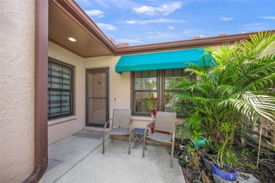 What a *WOW* when you walk into this beautifully updated villa on University Park Country Club in Florida - for sale on GolfHomes.com, golf home, golf lot