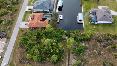 This exceptional WATERFRONT lot in South Gulf Cove offers direct on Rotonda Golf and Country Club - Long Marsh  in Florida - for sale on GolfHomes.com, golf home, golf lot