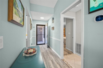 What a *WOW* when you walk into this beautifully updated villa on University Park Country Club in Florida - for sale on GolfHomes.com, golf home, golf lot