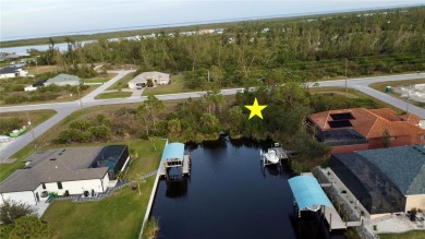 This exceptional WATERFRONT lot in South Gulf Cove offers direct on Rotonda Golf and Country Club - Long Marsh  in Florida - for sale on GolfHomes.com, golf home, golf lot