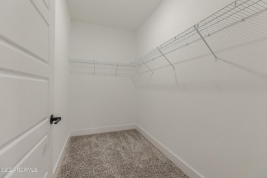 The Bella is a spacious, 2 bedroom, 2 bath condo, sprawling on Crow Creek Golf Club in North Carolina - for sale on GolfHomes.com, golf home, golf lot