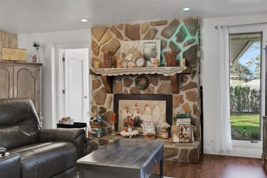 Welcome to this stunning home, where warmth and elegance await on The Grand Club - Pine Lakes Course in Florida - for sale on GolfHomes.com, golf home, golf lot