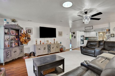 Welcome to this stunning home, where warmth and elegance await on The Grand Club - Pine Lakes Course in Florida - for sale on GolfHomes.com, golf home, golf lot