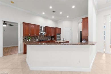 Offering over 3,000 square feet of one-level living with soaring on Estero Country Club in Florida - for sale on GolfHomes.com, golf home, golf lot