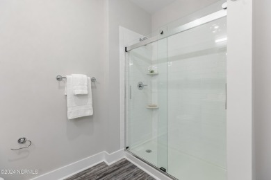 The Bella is a spacious, 2 bedroom, 2 bath condo, sprawling on Crow Creek Golf Club in North Carolina - for sale on GolfHomes.com, golf home, golf lot