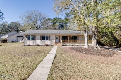 Welcome to this fully renovated, move-in ready ranch home in on Diamondhead Country Club in Mississippi - for sale on GolfHomes.com, golf home, golf lot