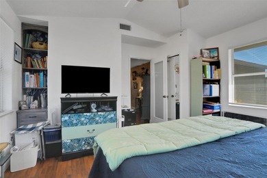 Welcome to this stunning home, where warmth and elegance await on The Grand Club - Pine Lakes Course in Florida - for sale on GolfHomes.com, golf home, golf lot