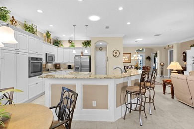 Under contract-accepting backup offers. Experience luxury living on Bella Glade Country Club in Florida - for sale on GolfHomes.com, golf home, golf lot