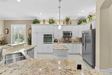 Under contract-accepting backup offers. Experience luxury living on Bella Glade Country Club in Florida - for sale on GolfHomes.com, golf home, golf lot