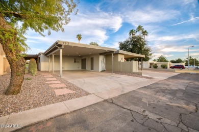 Nestled within the prestigious Painted Mountain Golf Course on Painted Mountain Golf Club in Arizona - for sale on GolfHomes.com, golf home, golf lot